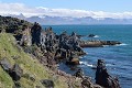 La côte ouest de l'Islande est remarquable par ses fjords, ses hautes falaises où nichent des milliers d'oiseaux de mer. Les vents et la mer corrodent, rongent, creusent, façonnent avec patience le littoral... cote,ouest,islande. 